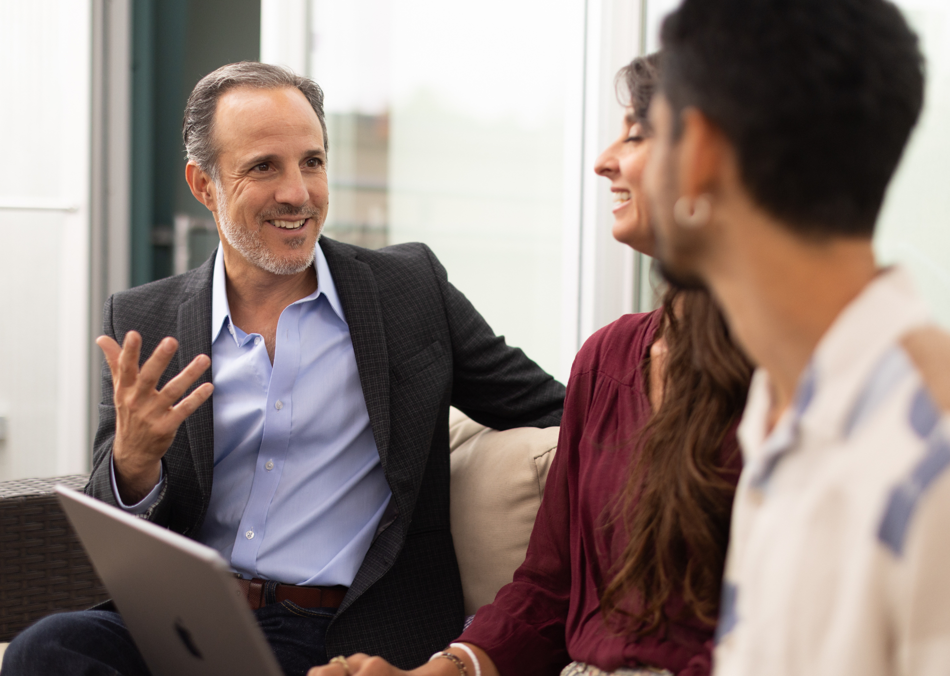 Simcha advising donors in a relaxed conversation